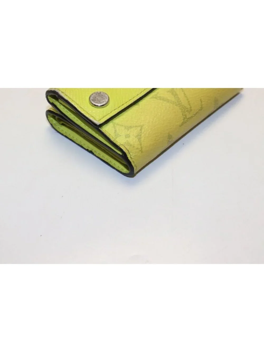 Louis Vuitton Taigarama Discovery Compact Leather Trifold Wallet